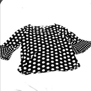 Women’s Blouse that has black and white polka dots
